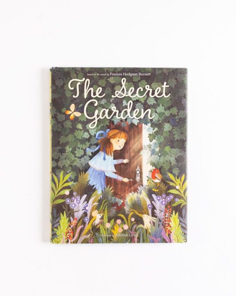 A book cover that shows a young girl open a door surrounded by foliage and flowers with scripted text in white that reads "The Secret Garden".