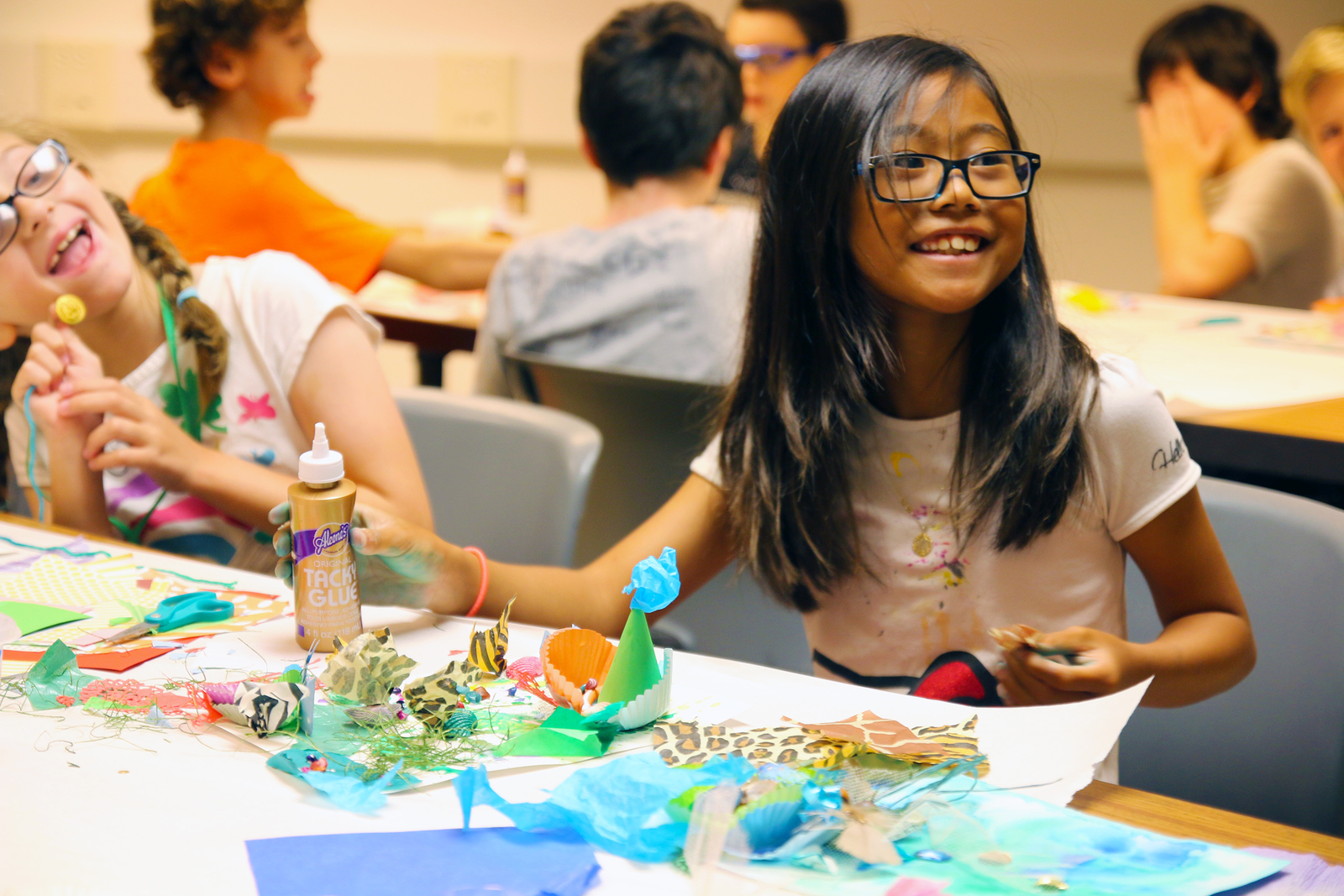 Children working on a collaged art project