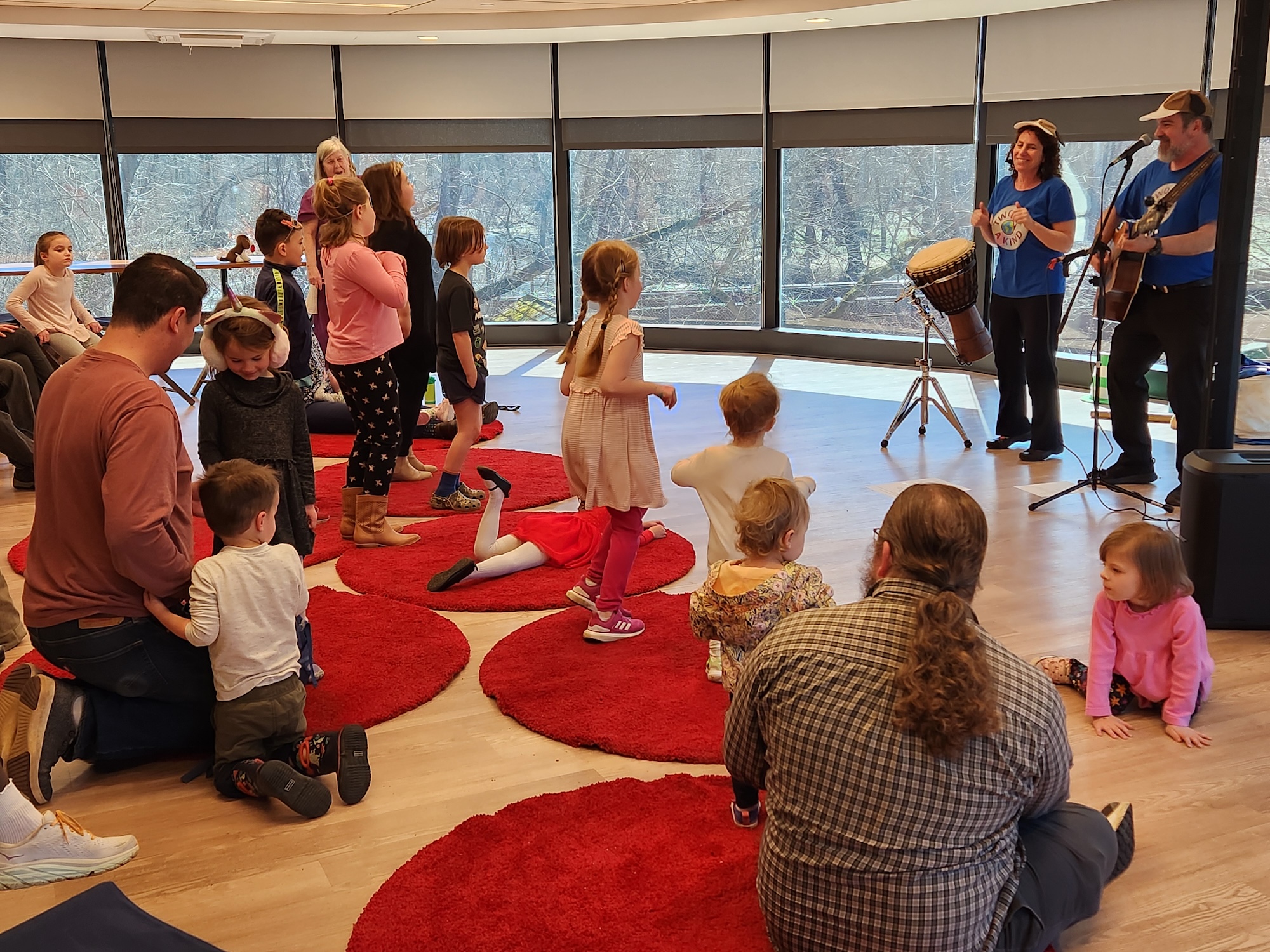 Musicians playing music for children