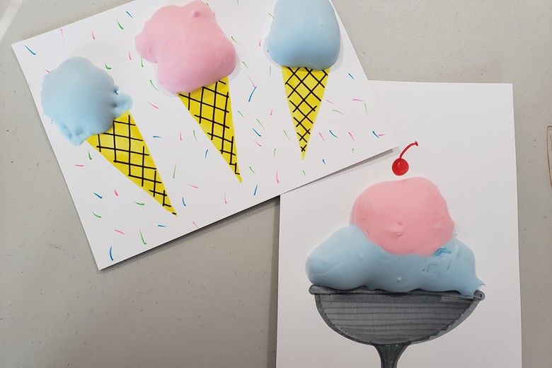 Artwork projects displaying ice cream cones and an ice cream sundae created using pink and blue puff paint