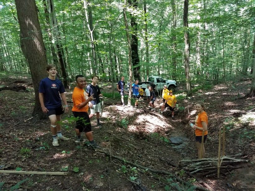 Potter Baseball Team working at the Laurels Preserve