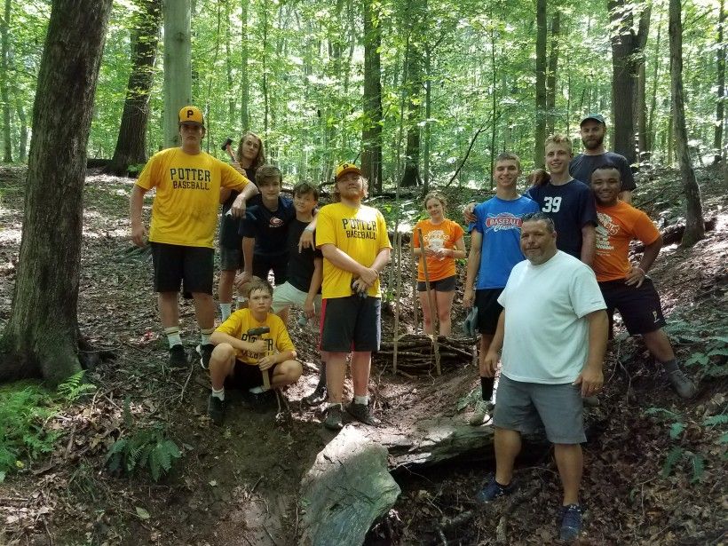 Potter Baseball Team working at the Laurels Preserve